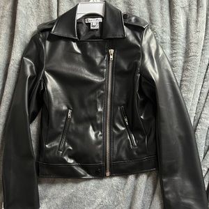 Black leather jacket with hardware
